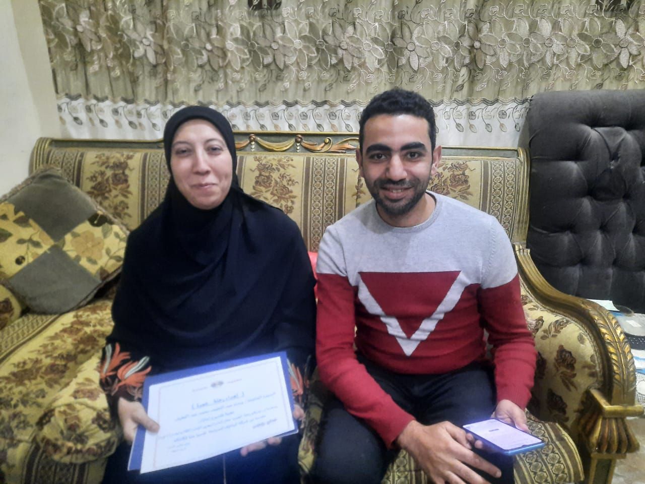 الحاجة وسام الفائزة في برنامج مدفع رمضان رفقة مراسل اليوم السابع في دمياط الحاجة وسام الفائزة في برنامج مدفع رمضان رفقة مراسل اليوم السابع في دمياط