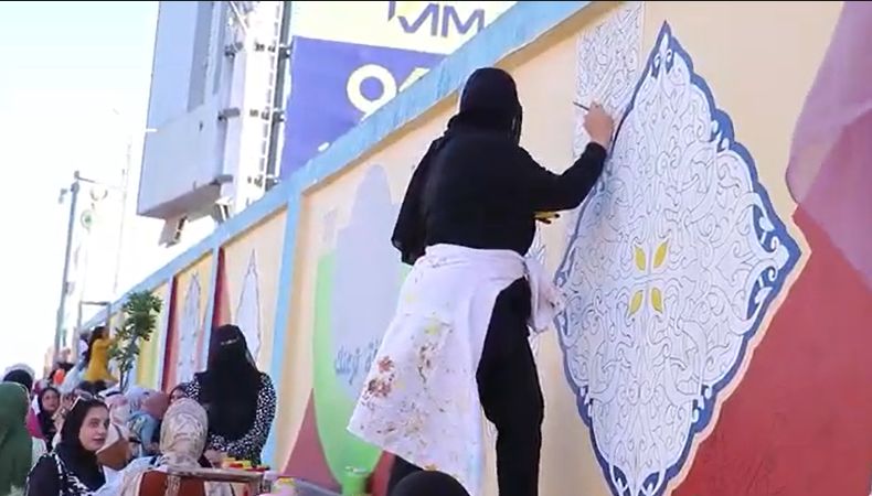 المشاركة في رسم الجداريات المشاركة في رسم الجداريات