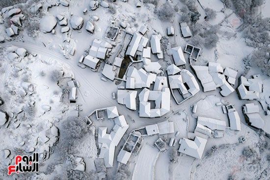 تساقط الثلج بكثافة تساقط الثلج بكثافة