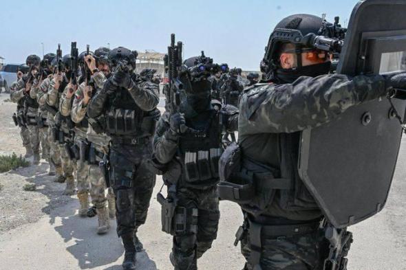 الحرس الوطني وشرطة أبوظبي ينفذان تدريباً ميدانياً