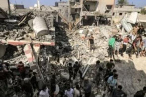 خان يونس تستقبل حافلة تقل فلسطينيين عائدين إلى القطاع