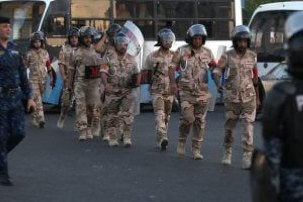 اشتباكات
بين
الشرطة
العراقية
ومتظاهرين
عند
مدخل
المنطقة
الخضراء
في
بغداد