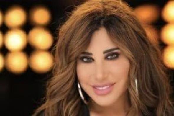نجوى كرم تضع حدا لشائعات الطلاق بظهورها مع زوجها